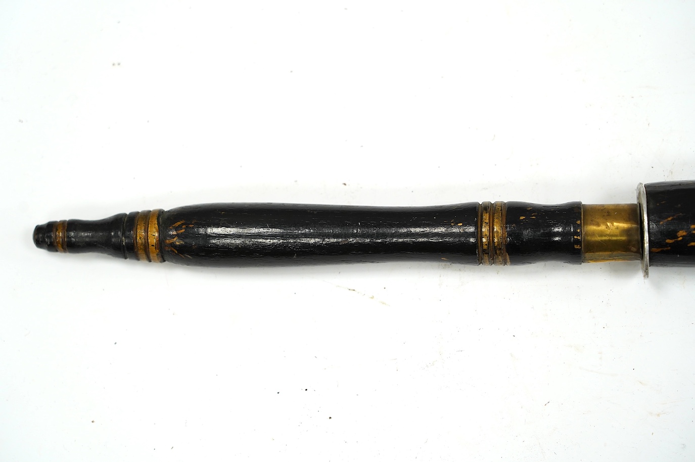 A Thai sword Dha, with a lacquered hilt and wooden scabbard, blade 56cm. Condition - fair